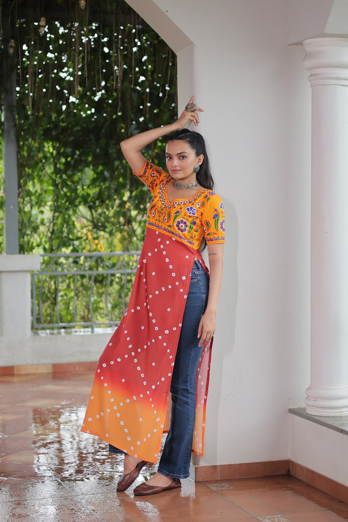 Yellow & Peach shade Navratri Special Printed Rayon Kurti with Kutchi Gamthi Embroidery & Pan Neck ClothsVilla