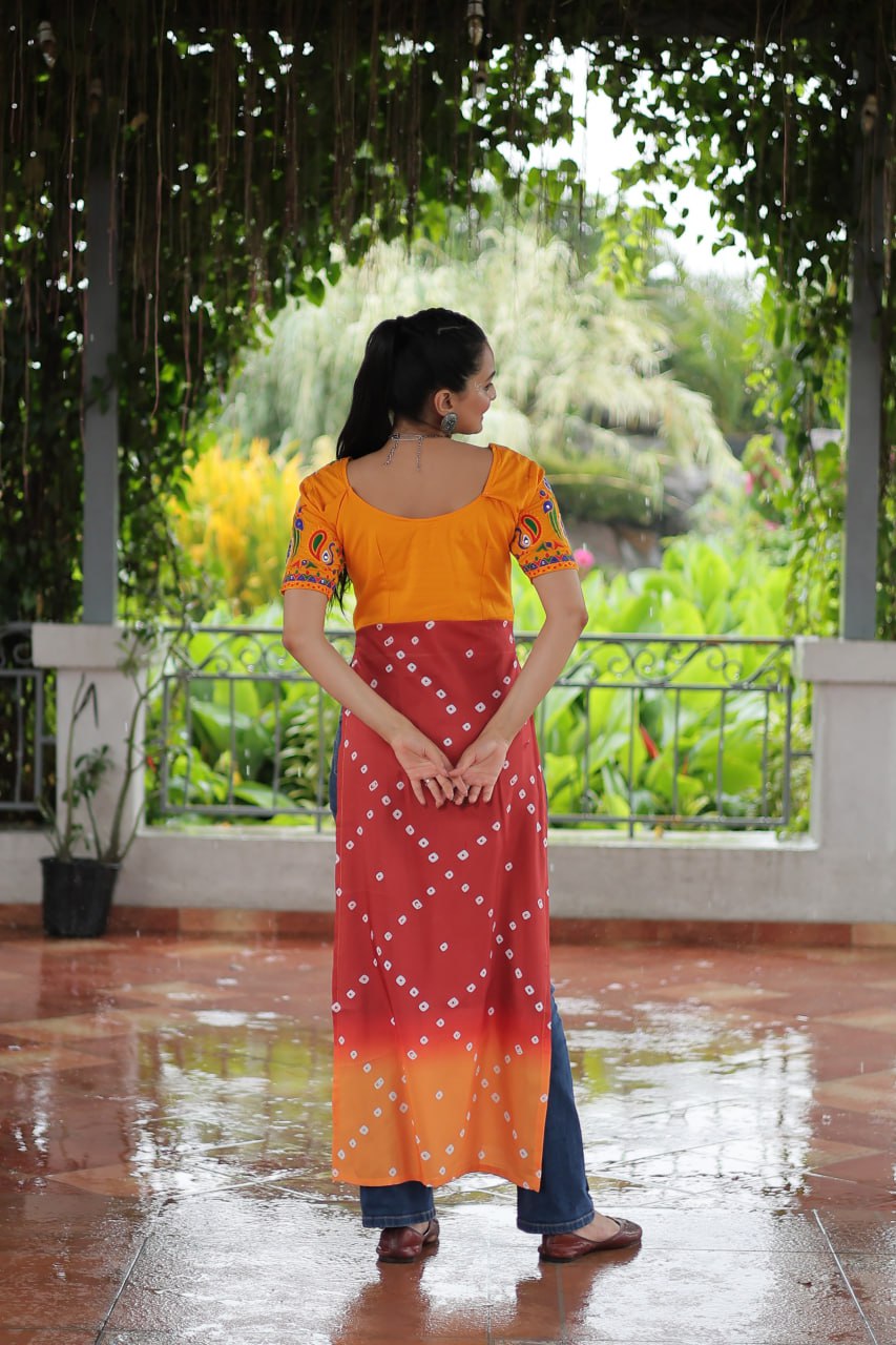 Yellow & Peach shade Navratri Special Printed Rayon Kurti with Kutchi Gamthi Embroidery & Pan Neck ClothsVilla