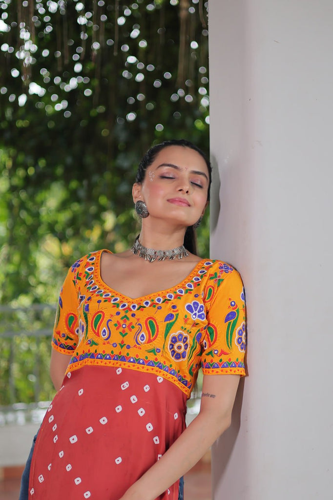 Yellow & Peach shade Navratri Special Printed Rayon Kurti with Kutchi Gamthi Embroidery & Pan Neck ClothsVilla