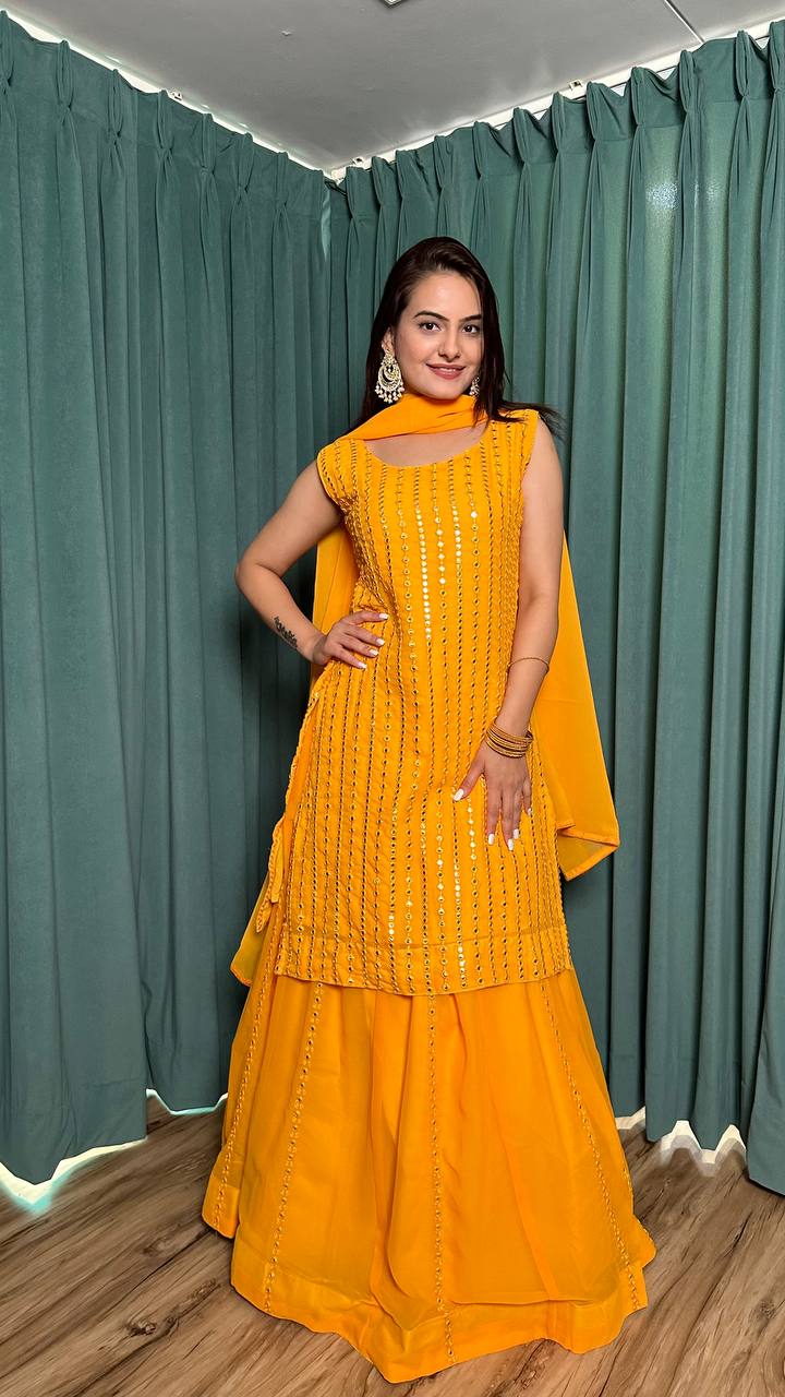 Yellow Radiant Georgette Lehenga Set & Paper Mirror Work ClothsVilla Main image