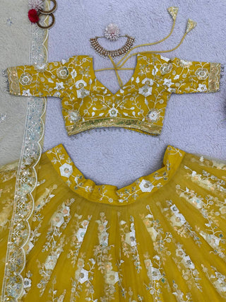 Yellow Radiant Soft Net Semi-Stitched Lehenga Set with Sequence Embroidery & Fancy Latkans ClothsVilla