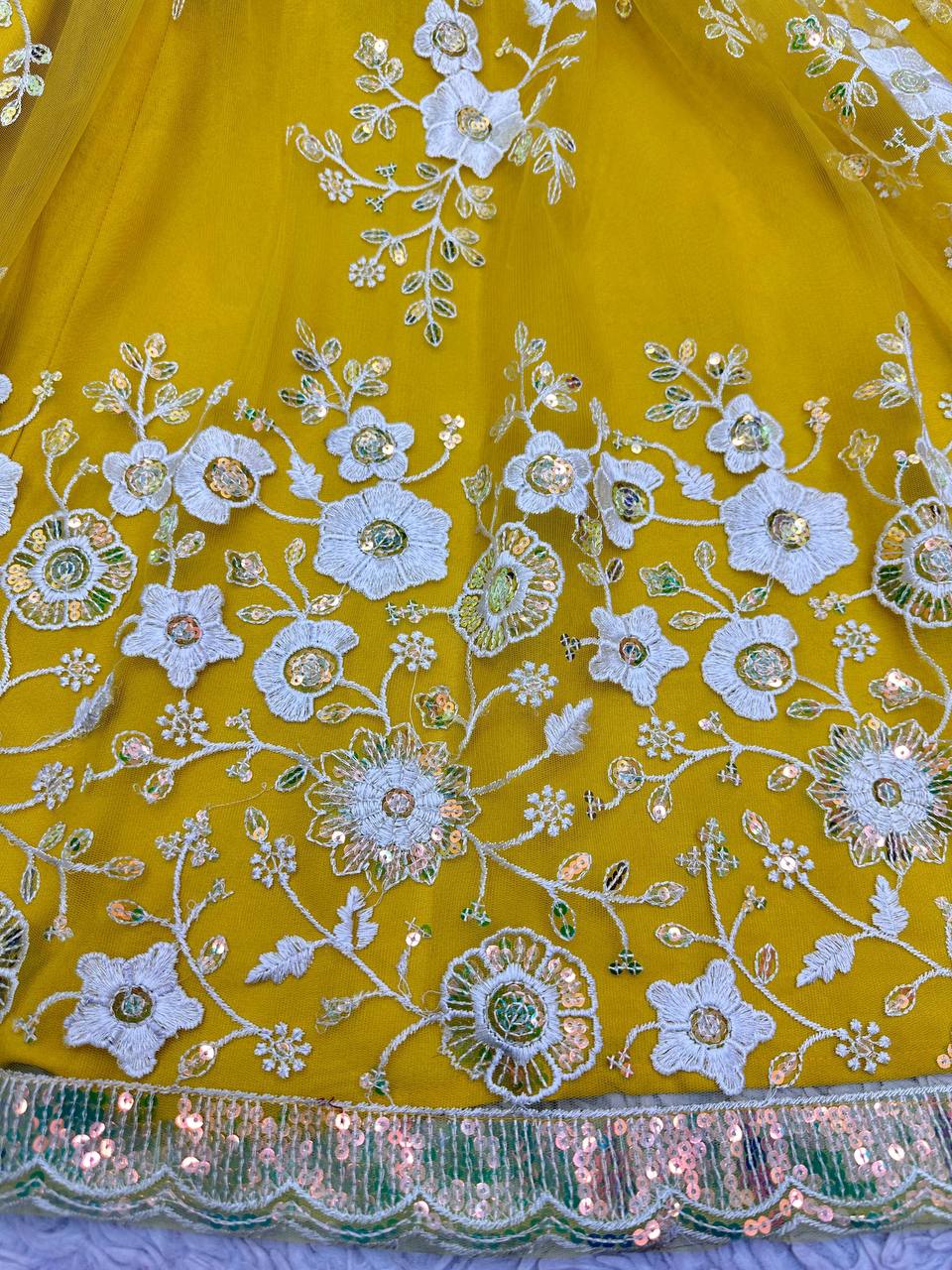 Yellow Radiant Soft Net Semi-Stitched Lehenga Set with Sequence Embroidery & Fancy Latkans ClothsVilla