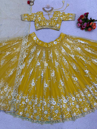 Yellow Radiant Soft Net Semi-Stitched Lehenga Set with Sequence Embroidery & Fancy Latkans ClothsVilla