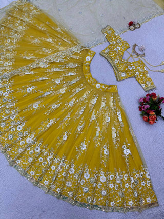 Yellow Radiant Soft Net Semi-Stitched Lehenga Set with Sequence Embroidery & Fancy Latkans ClothsVilla