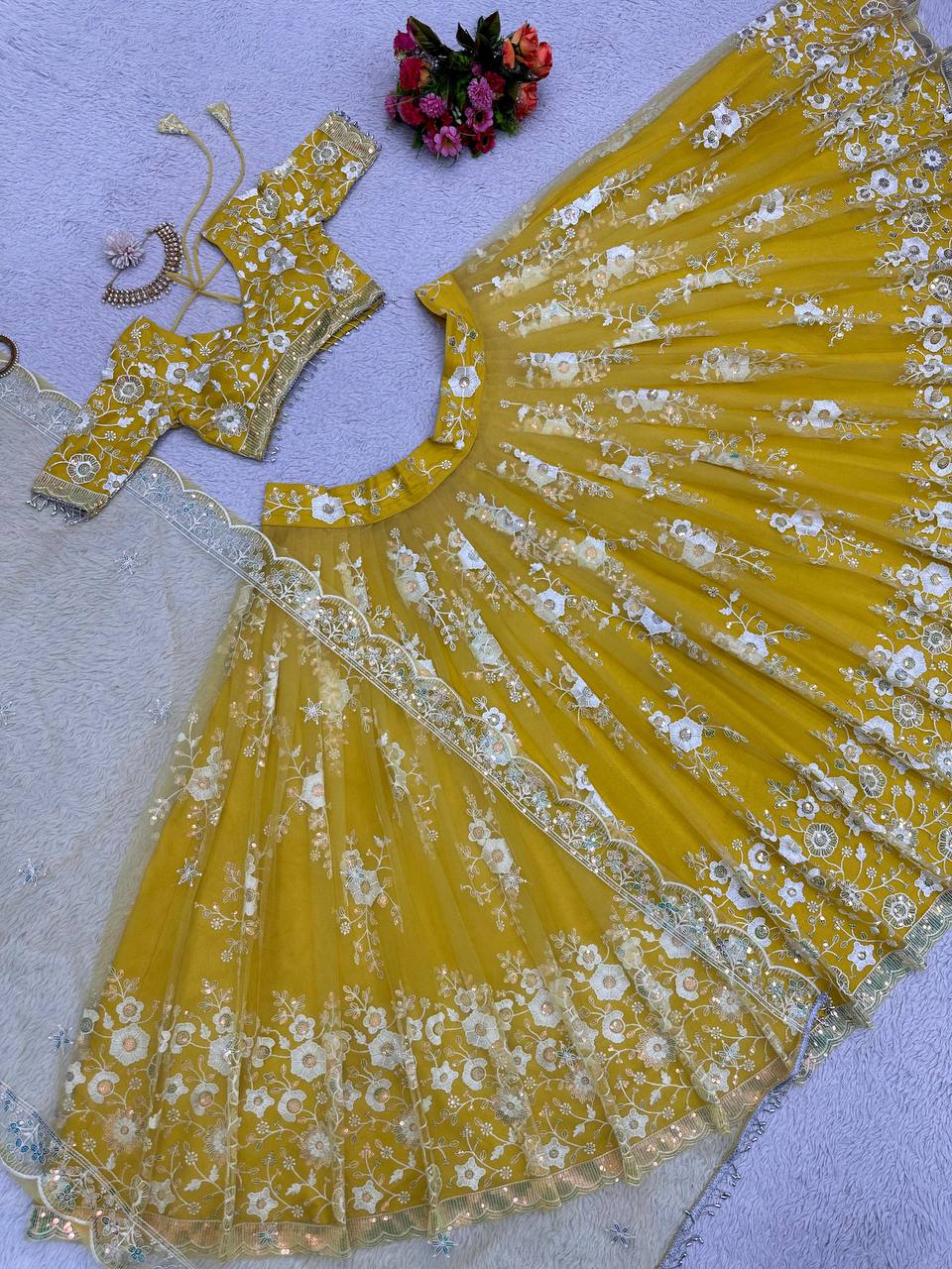 Yellow Radiant Soft Net Semi-Stitched Lehenga Set with Sequence Embroidery & Fancy Latkans ClothsVilla