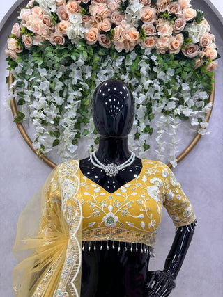 Yellow Radiant Soft Net Semi-Stitched Lehenga Set with Sequence Embroidery & Fancy Latkans ClothsVilla