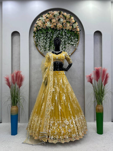 Yellow Radiant Soft Net Semi-Stitched Lehenga Set with Sequence Embroidery & Fancy Latkans ClothsVilla