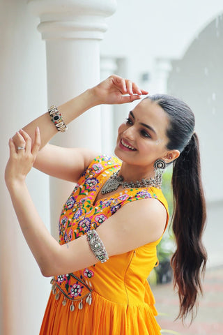 Yellow Rayon Navratri Gown with Kutchi Gamthi Embroidery & Mirror Work – Sleeveless with Flair ClothsVilla