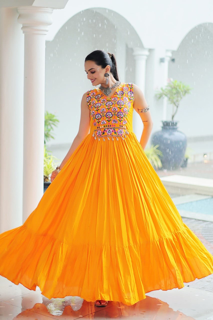 Yellow Rayon Navratri Gown with Kutchi Gamthi Embroidery & Mirror Work – Sleeveless with Flair ClothsVilla
