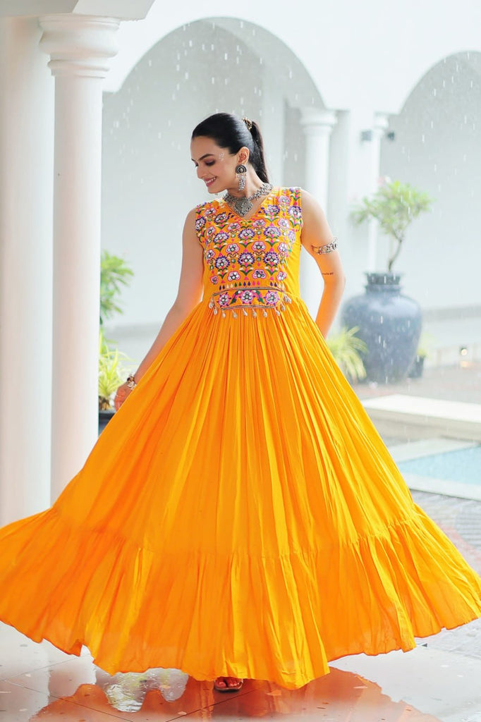 Yellow Rayon Navratri Gown with Kutchi Gamthi Embroidery & Mirror Work – Sleeveless with Flair ClothsVilla