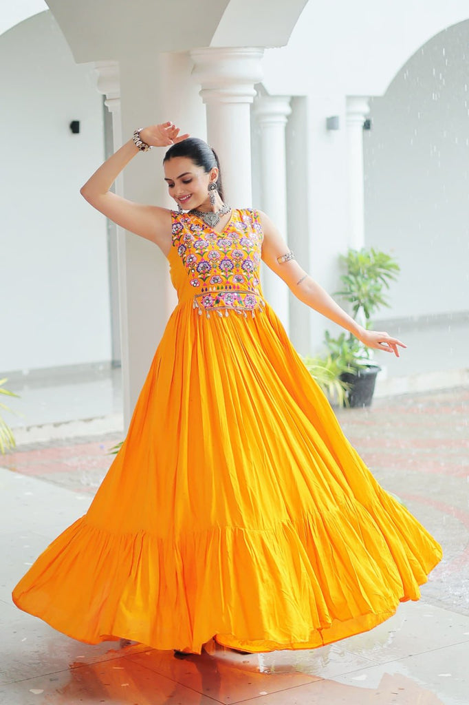 Yellow Rayon Navratri Gown with Kutchi Gamthi Embroidery & Mirror Work – Sleeveless with Flair ClothsVilla