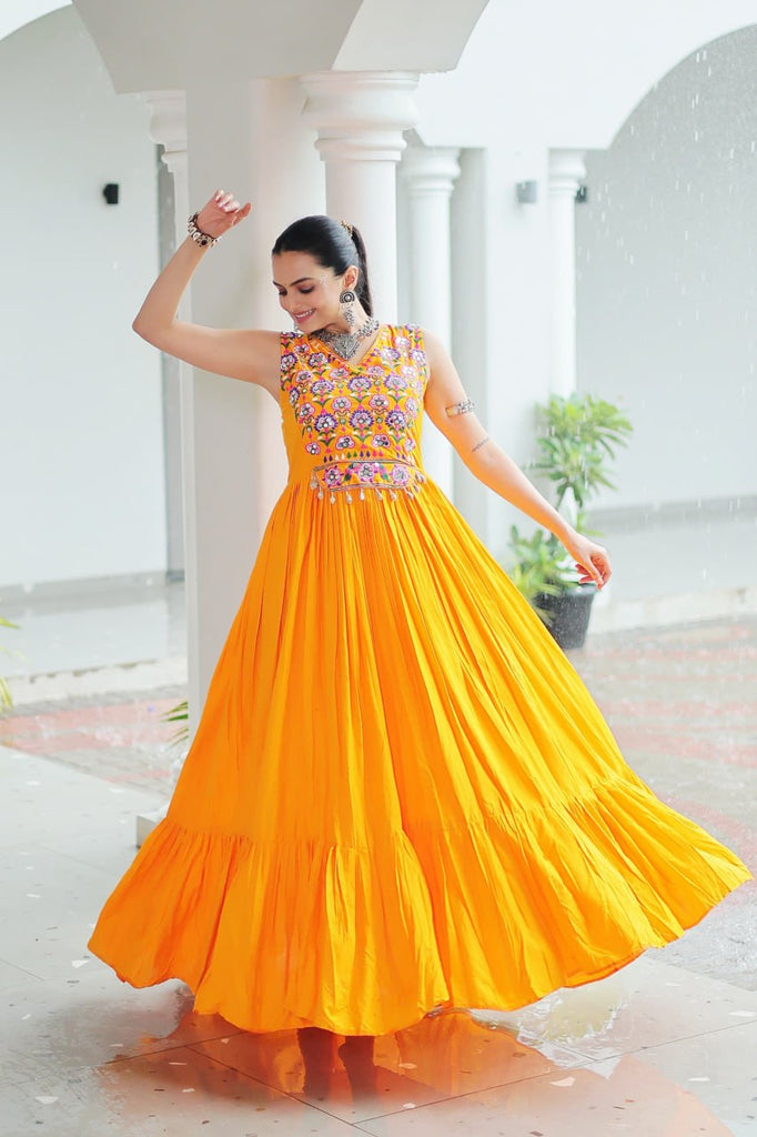Yellow Rayon Navratri Gown with Kutchi Gamthi Embroidery & Mirror Work – Sleeveless with Flair ClothsVilla