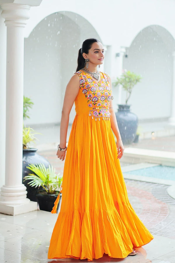 Yellow Rayon Navratri Gown with Kutchi Gamthi Embroidery & Mirror Work – Sleeveless with Flair ClothsVilla