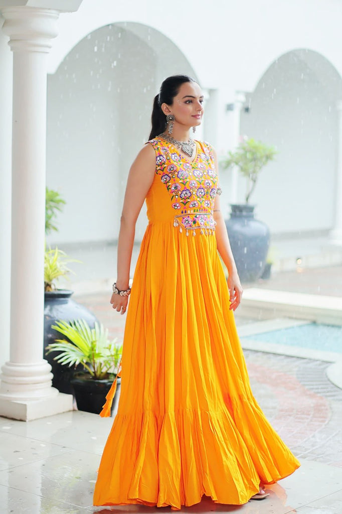 Yellow Rayon Navratri Gown with Kutchi Gamthi Embroidery & Mirror Work – Sleeveless with Flair ClothsVilla