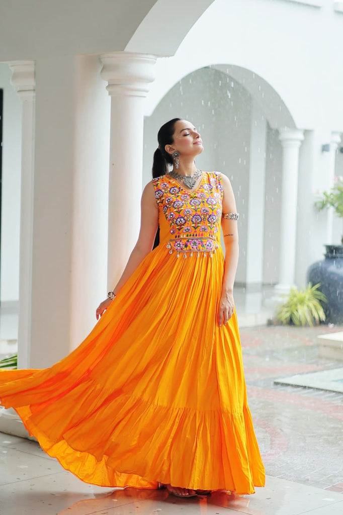 Yellow Rayon Navratri Gown with Kutchi Gamthi Embroidery & Mirror Work – Sleeveless with Flair ClothsVilla