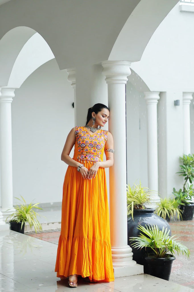 Yellow Rayon Navratri Gown with Kutchi Gamthi Embroidery & Mirror Work – Sleeveless with Flair ClothsVilla