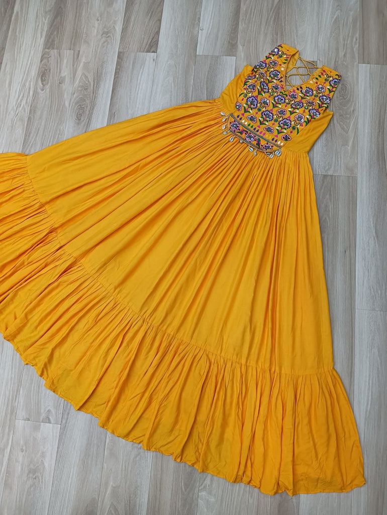 Yellow Rayon Navratri Gown with Kutchi Gamthi Embroidery & Mirror Work – Sleeveless with Flair ClothsVilla