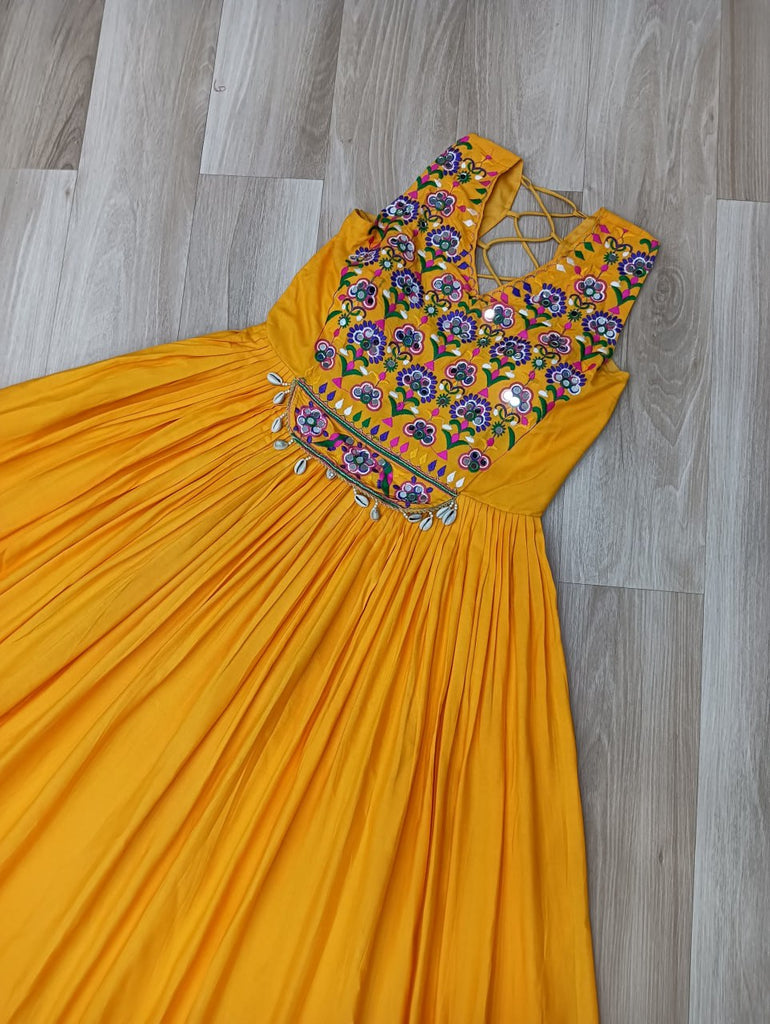 Yellow Rayon Navratri Gown with Kutchi Gamthi Embroidery & Mirror Work – Sleeveless with Flair ClothsVilla