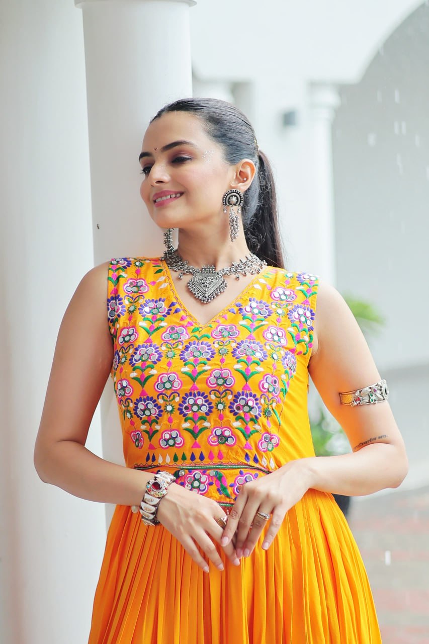 Yellow Rayon Navratri Gown with Kutchi Gamthi Embroidery & Mirror Work – Sleeveless with Flair ClothsVilla