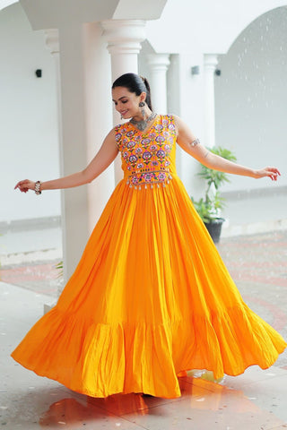 Yellow Rayon Navratri Gown with Kutchi Gamthi Embroidery & Mirror Work – Sleeveless with Flair ClothsVilla