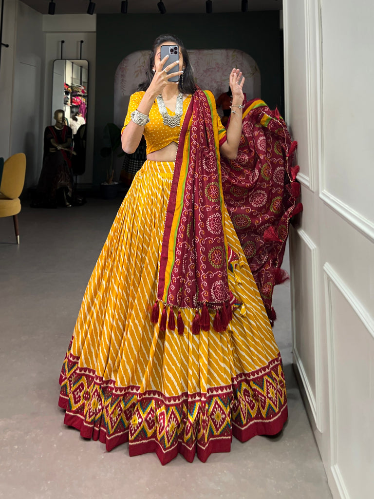 Yellow Tussar Silk Lehenga Choli with Leheriya Print, Patola Border & Bandhani Dupatta ClothsVilla