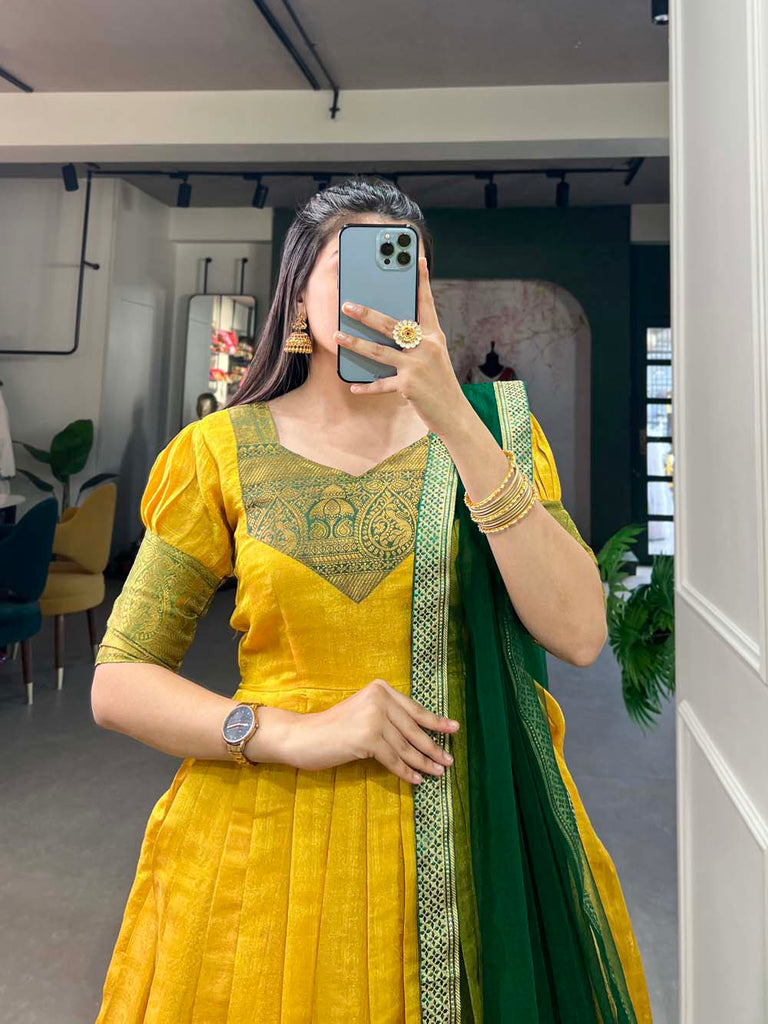 Regal Yellow Zari Woven Kanjivaram Gown with Net Dupatta ClothsVilla