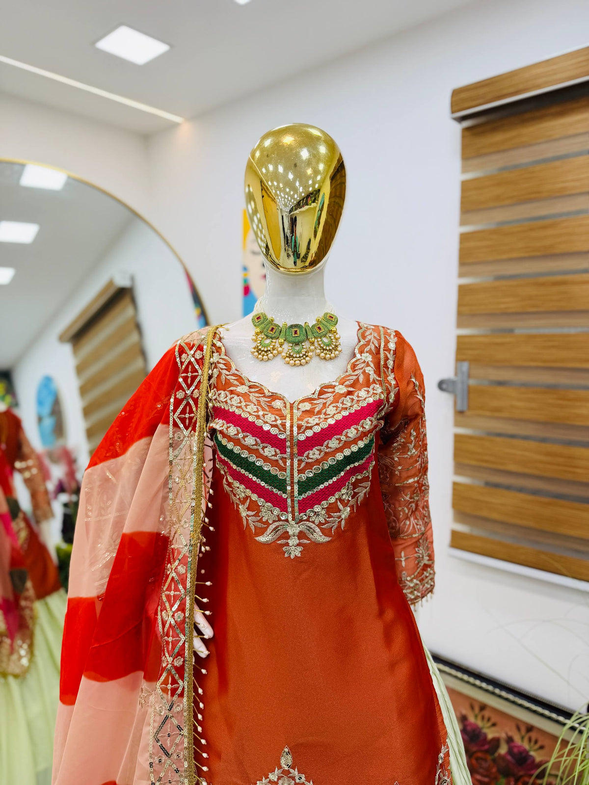 Embroidered Top with Crepe Silk Lehenga & Printed Organza Dupatta – Rust Orange & Teal Blue ClothsVilla