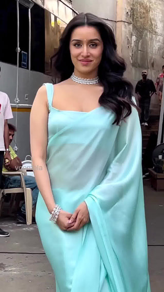 Sky color Fluffy Satin Saree with same tone silk blouse for women Clothsvilla