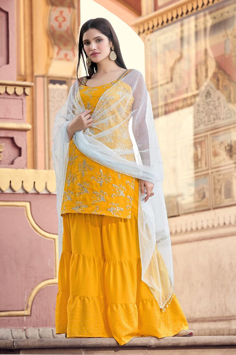 Mustard Yellow Semi Stitched Kurti And Sharara Set For Party Wear Clothsvilla Main image