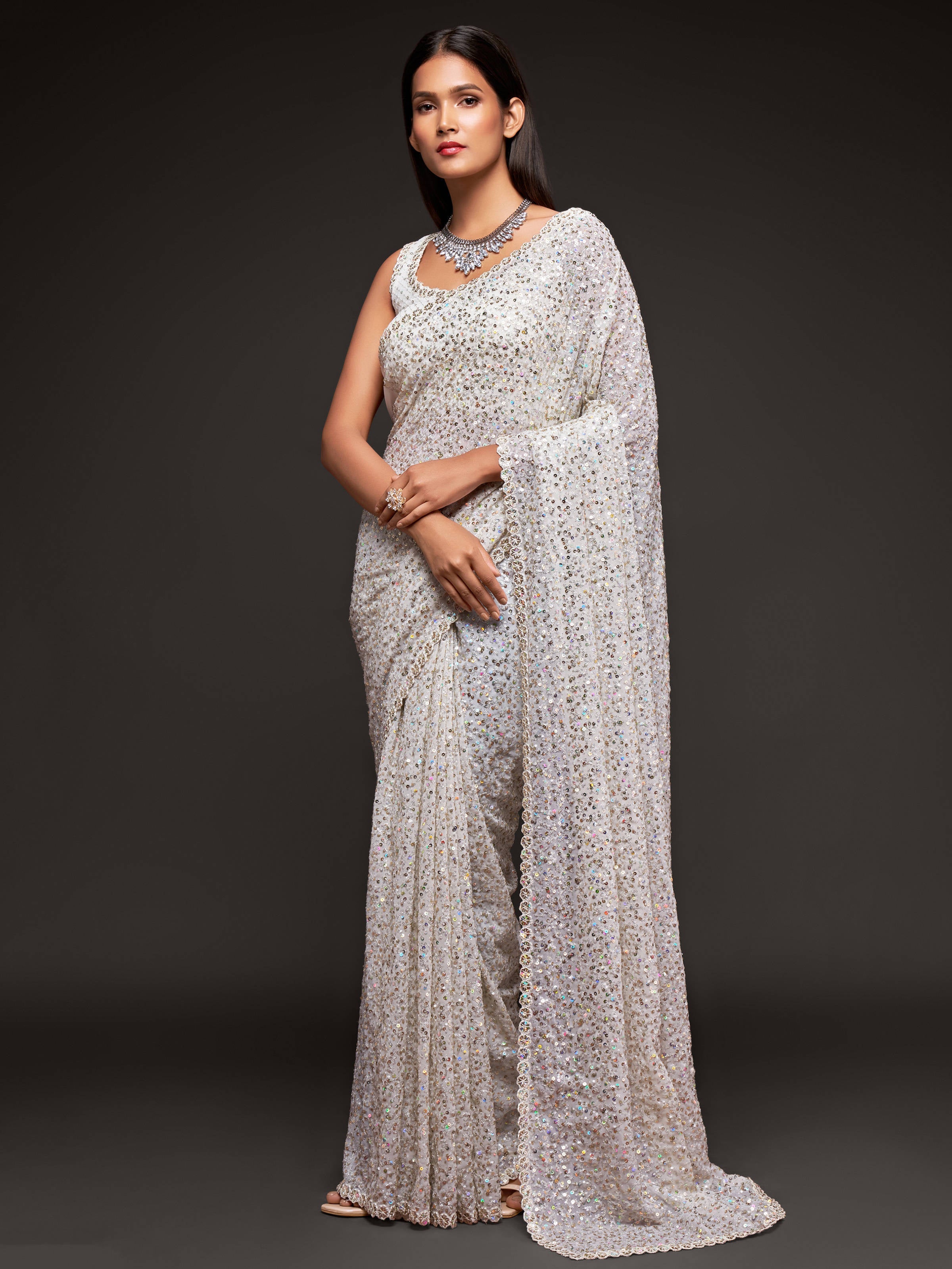Beautiful Pearl White Sequined Georgette Party Wear Saree ClothsVilla Main image