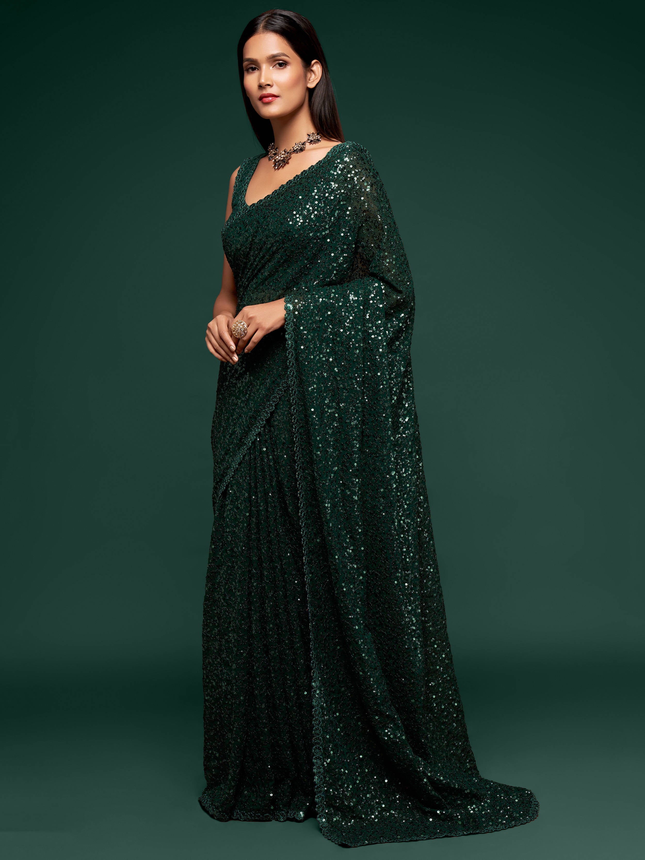 Awesome Deep Green Sequined Georgette Party Wear Saree ClothsVilla Main image