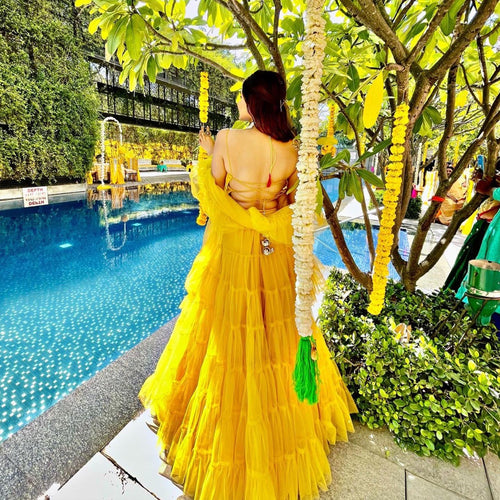 Yellow Ruffle Lehenga Choli in Soft Net with Full Flair and Dupatta ClothsVilla