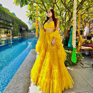 Yellow Ruffle Lehenga Choli in Soft Net with Full Flair and Dupatta ClothsVilla