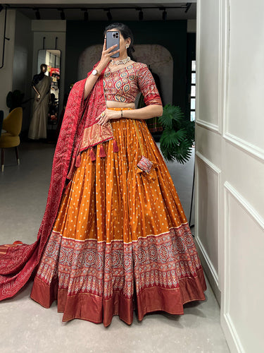 Orange Color Bandhani And Ajrakh Print With Foil Work  Dola Silk Chaniya Choli Clothsvilla