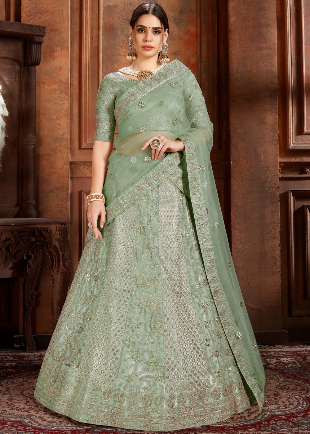 Pista Green Soft Net Lehenga Choli with Thread,Zari, Zarkan & Pearl work Clothsvilla