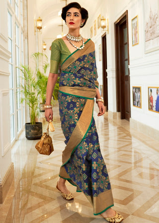 Light Blue Patola Silk Saree with Golden Border Clothsvilla