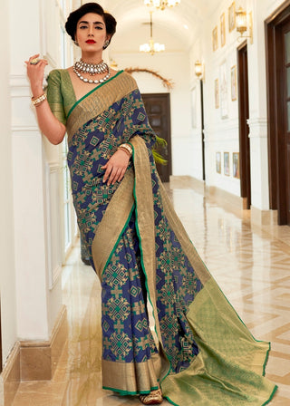 Light Blue Patola Silk Saree with Golden Border Clothsvilla
