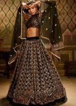 Load image into Gallery viewer, Pebble Black Soft Net Designer Lehenga Choli with overall Sequins work Clothsvilla