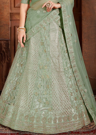 Pista Green Soft Net Lehenga Choli with Thread,Zari, Zarkan & Pearl work Clothsvilla