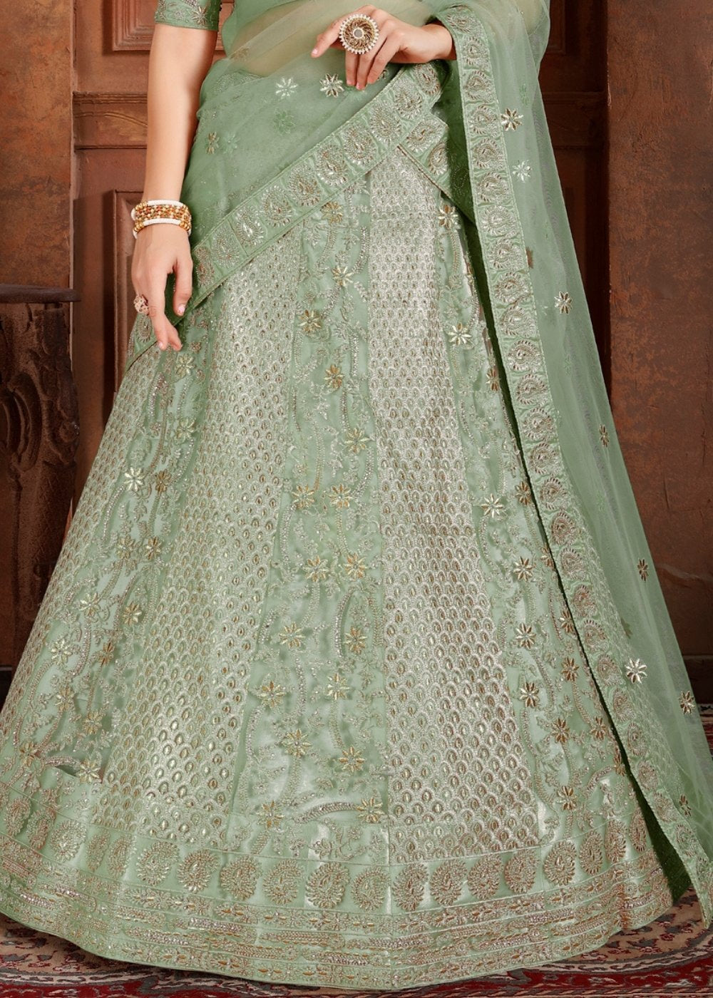 Pista Green Soft Net Lehenga Choli with Thread,Zari, Zarkan & Pearl work Clothsvilla