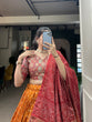 Load image into Gallery viewer, Orange Color Bandhani And Ajrakh Print With Foil Work  Dola Silk Chaniya Choli Clothsvilla