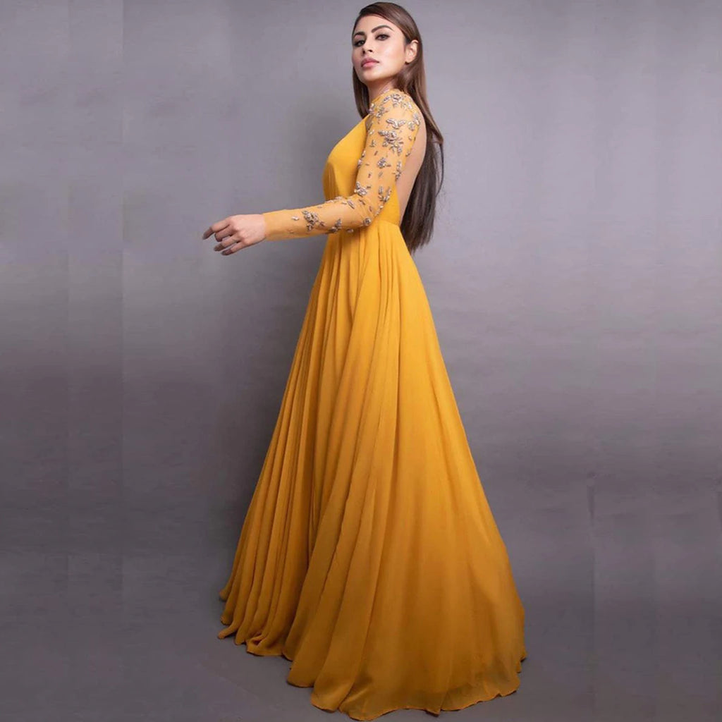 Stunning Mustard colored 8 Meter Flared Maxi Gown with Embellished Sleeves. ClothsVilla