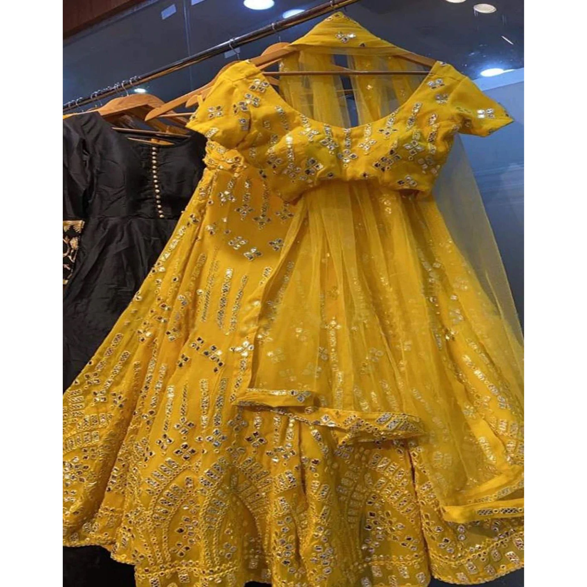 Yellow Georgette Lehenga Choli with Resham And Mirror Work ClothsVilla Main image
