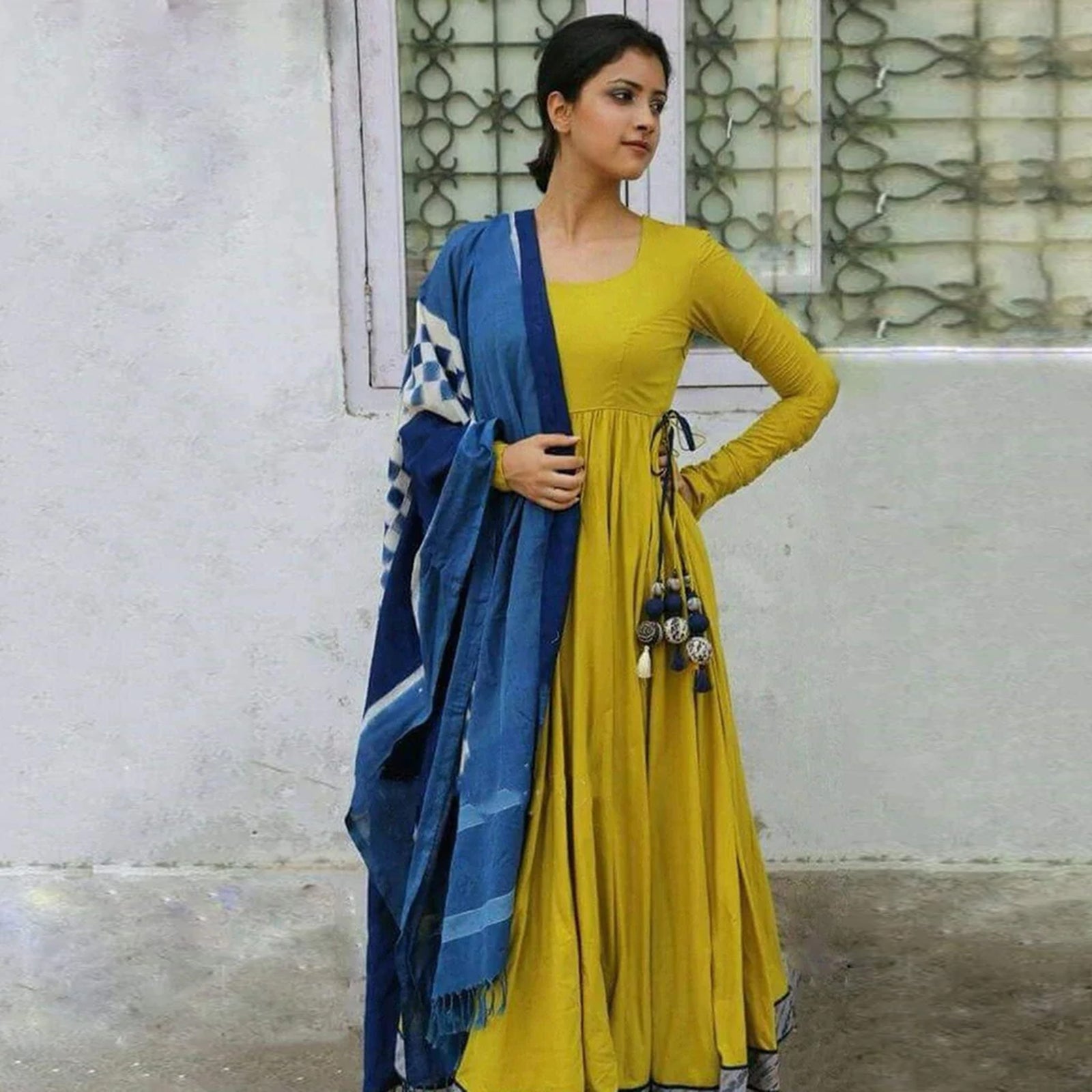 Anarkali Suit in Mahendi Green Color Made with Rayon Fabrics ClothsVilla