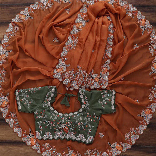 Beautiful Organza Orange Saree with Embroidery work and Contrast matching Mehendi Blouse ClothsVilla