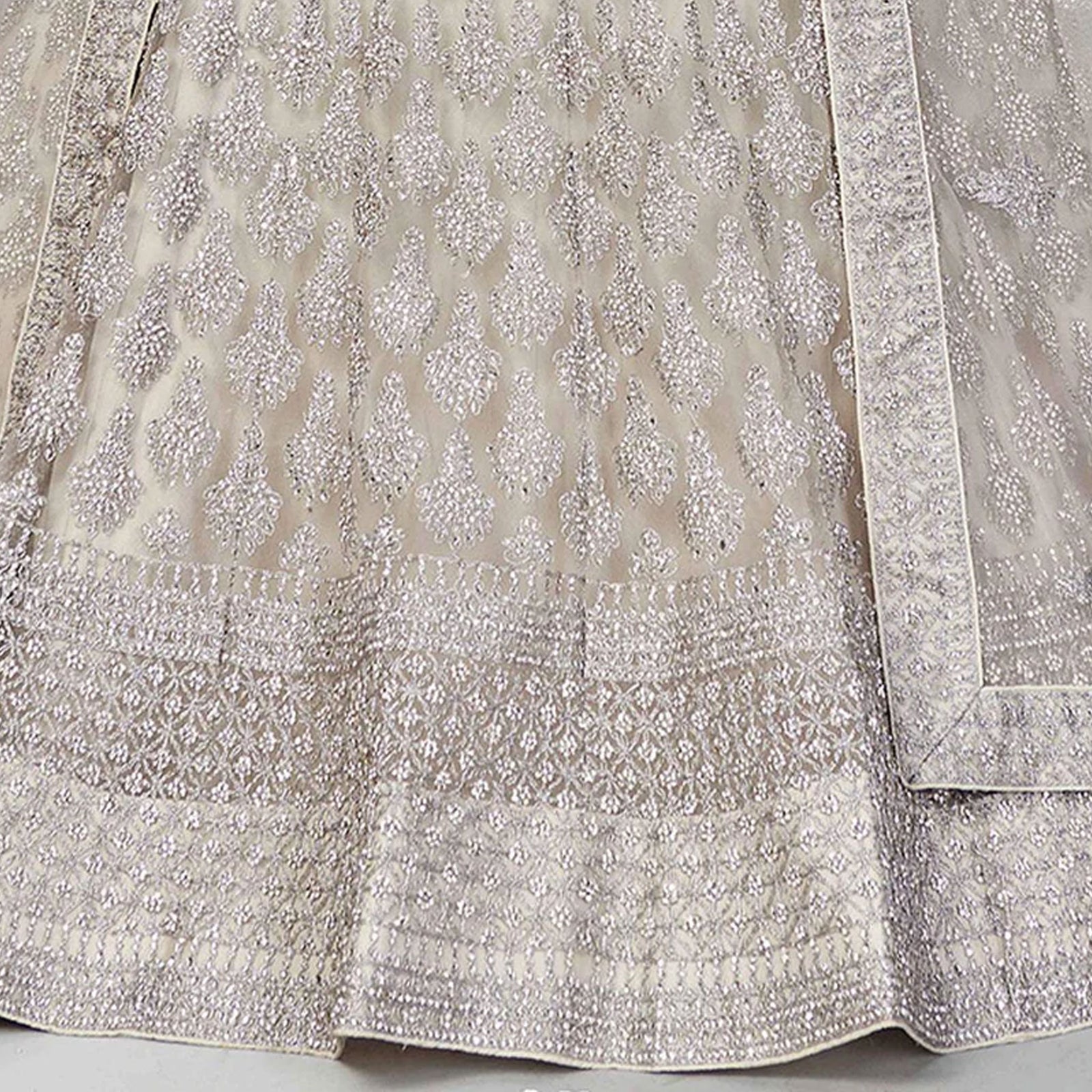 Pale Silver Lehenga Choli in Soft Net with Thread Sequence and Zari Work ClothsVilla