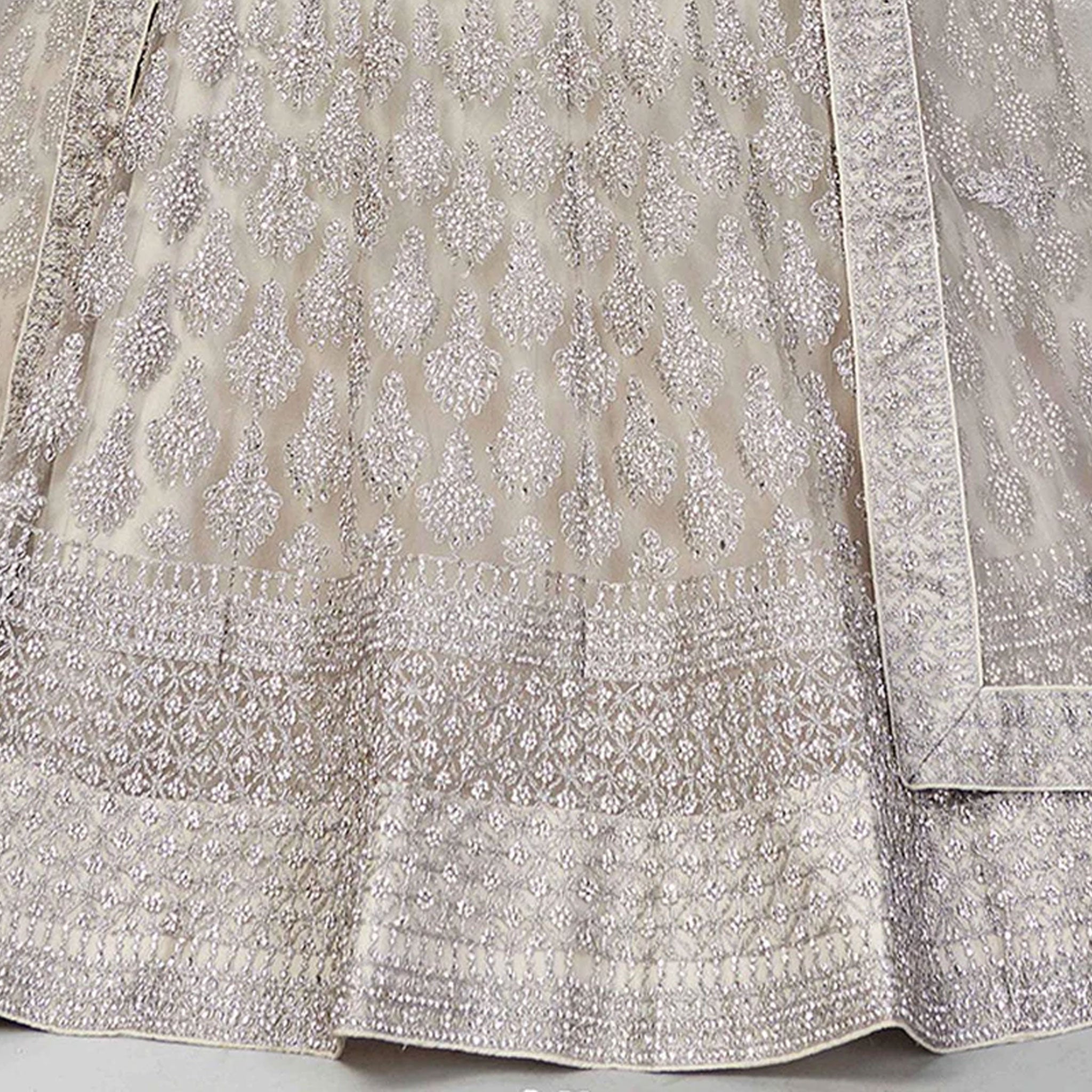 Pale Silver Lehenga Choli in Soft Net with Thread Sequence and Zari Work ClothsVilla