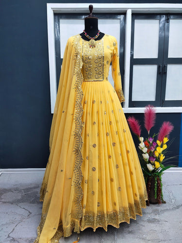 Yellow Color Satin Fabric Partywear Gown With Mirror Work