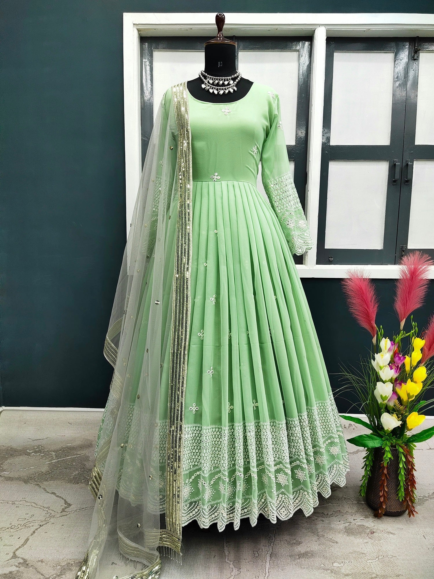 Marvelous Pista Color Embroidery Thread Work Gown Clothsvilla