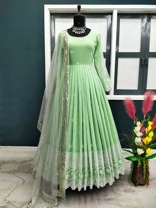 Marvelous Pista Color Embroidery Thread Work Gown Clothsvilla